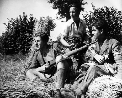 A group of men holding guns